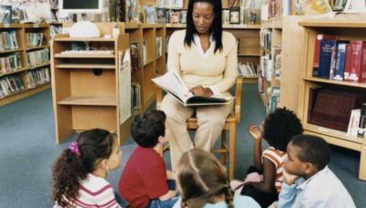 woman reading aloud to class