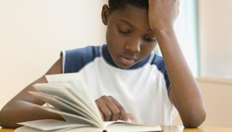 Boy reading book
