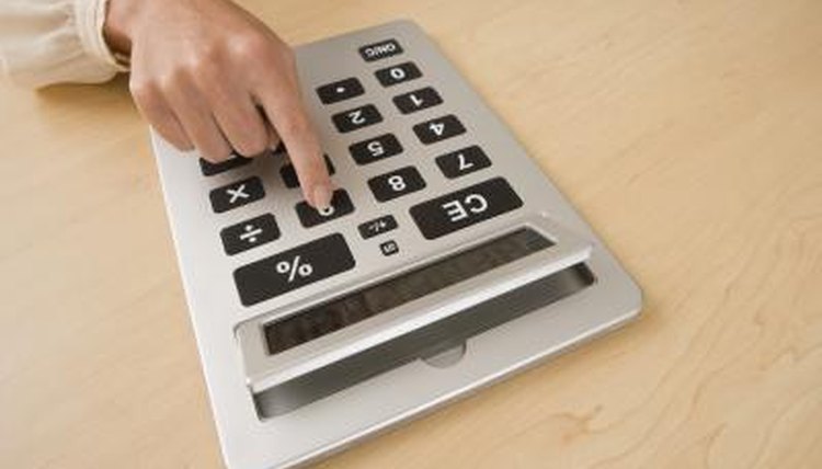 Calculating with a calculator.