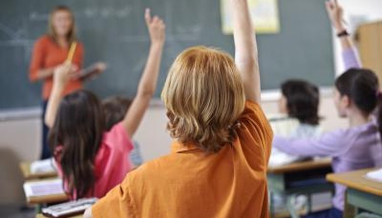 student raising his hand