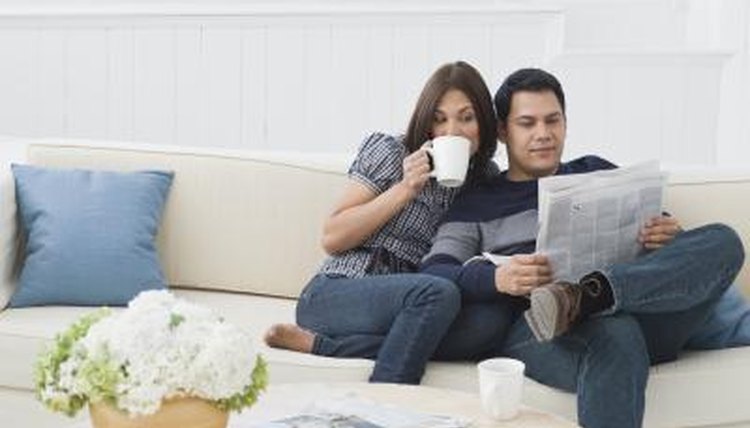 couple reading newspaper