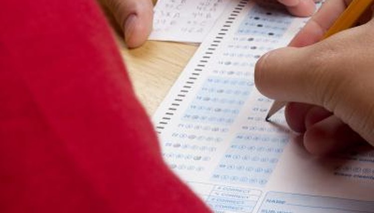 student filling out multiple choice quiz