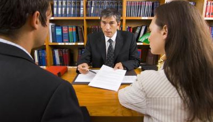 Man and woman with lawyer