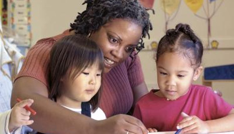 Preschool teacher with children