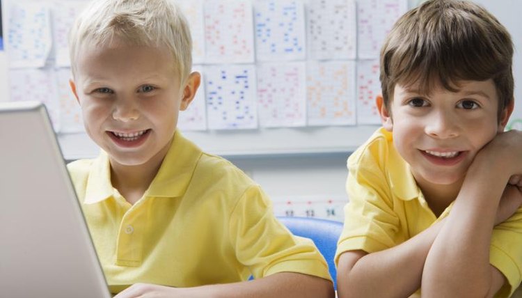 Two young boys in school.