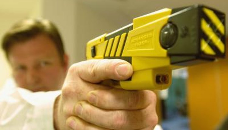 Policeman with Taser