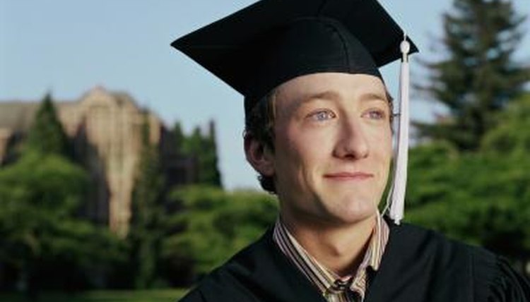 College graduate smiling in cap and gown