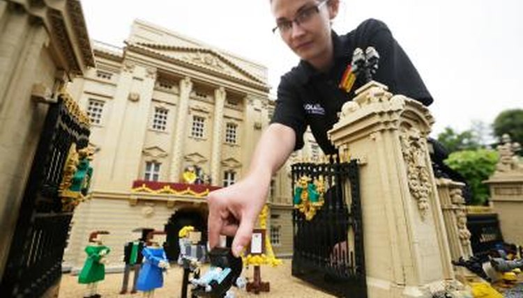 Model maker with Lego constructed Buckingham Palace