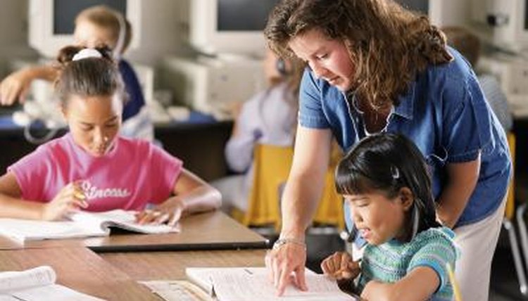 Walking around the room and standing next to students who may be causing a problem will usually eliminate the problem quickly.