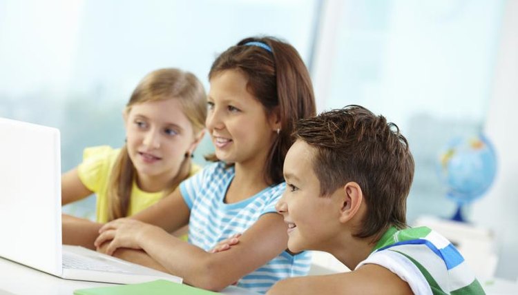 Children doing research on computer