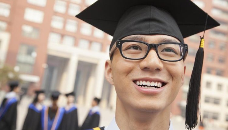 College graduate wearing cap and gown