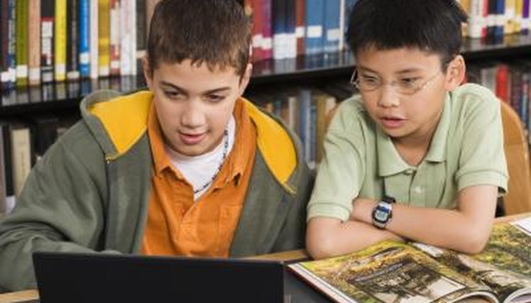 Combine modern technology and traditional display methods for a creative multimedia school project display.