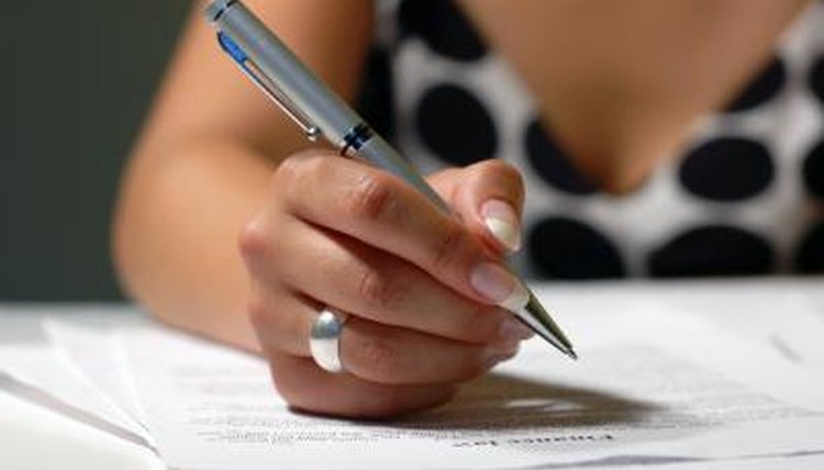 Woman writing affidavit