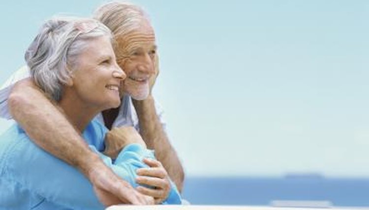 A smiling mature couple outdoors.