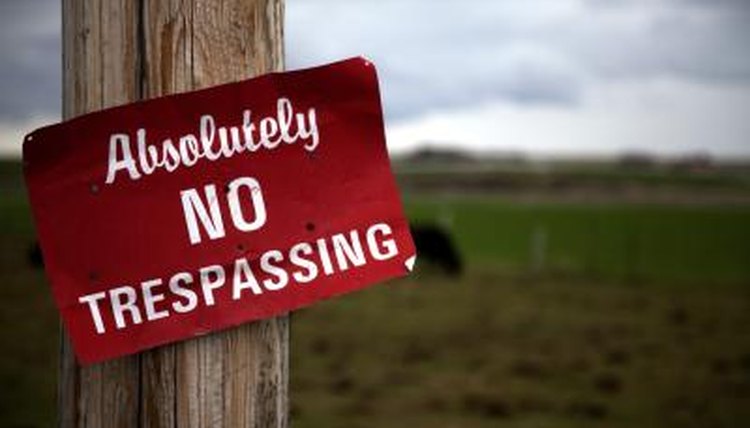 No Trespassing sign on farm
