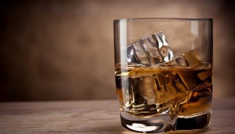 Glass of whiskey with ice