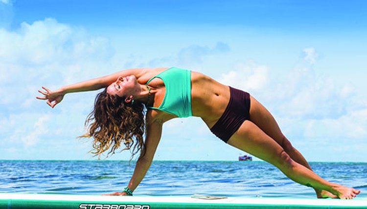 12 Amazing Paddleboard Yoga Poses (and How to Do Them) - SportsRec