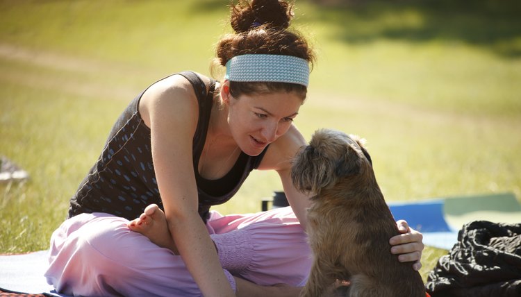 Yoga girl with her dog