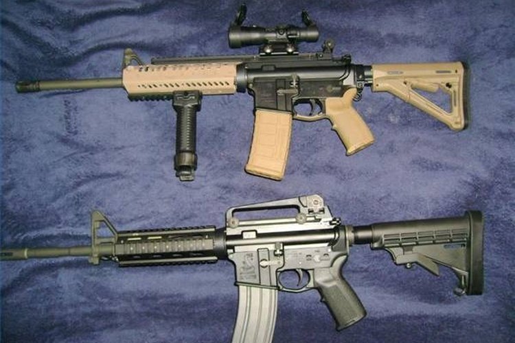 AR-15.com Two rifles- top one with scope, and the bottom AR-15 without