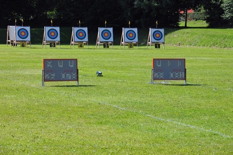 Archery targets and electronic results display image by Rony Zmiri from Fotolia.com Use the archery range to properly adjust your compound bow.