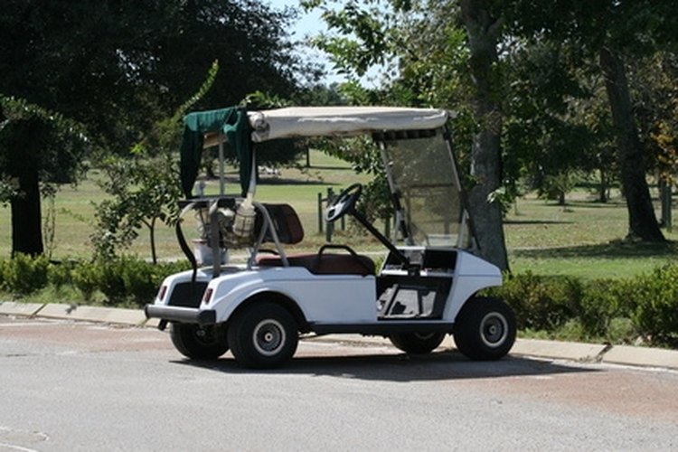 golf cart image by Earl Robbins from Fotolia.com Regularly check if your golf cart batteries are in good condition.