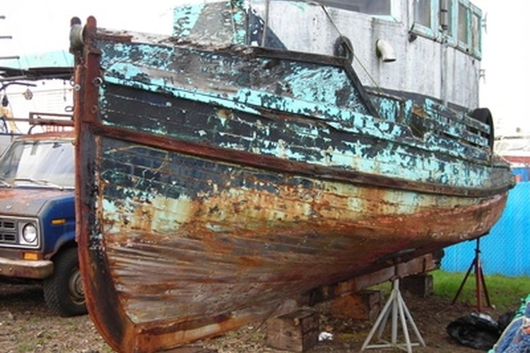 boat image by pearlguy from Fotolia.com Compound and a wax job don't solve every problem.