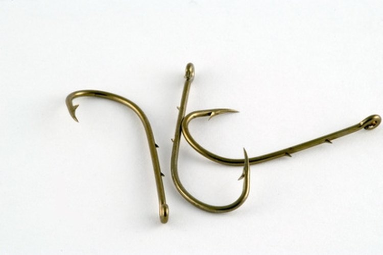 hook image by Zbigniew Nowak from Fotolia.com String a hook to your line with an improved clinch knot.