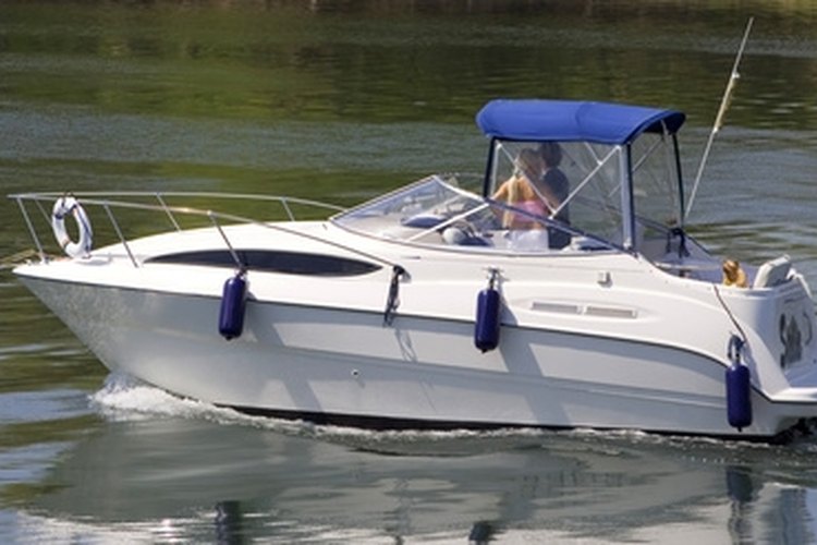 boat image by michele goglio from Fotolia.com Check and fill your Mercriser power trim fluid.