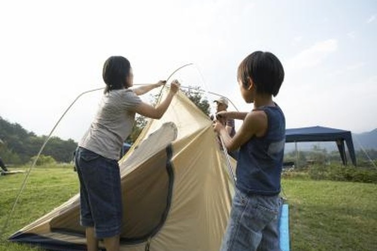 Seiya Kawamoto/Lifesize/Getty Images Setup for the Cougar Flats II tent requires several people.
