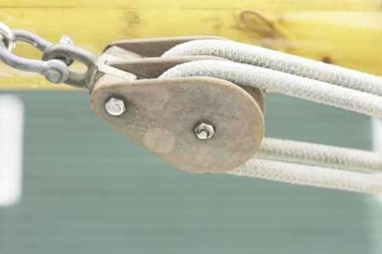 Hemera Technologies/AbleStock.com/Getty Images Hang your kayak in your garage with a pulley system.