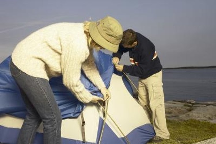 Hemera Technologies/AbleStock.com/Getty Images The rain fly protects the tent body from the elements.