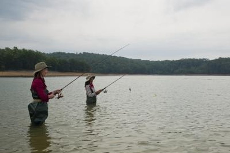 Erik Snyder/Photodisc/Getty Images Cast and retrieve shad rigs from a stationary position.