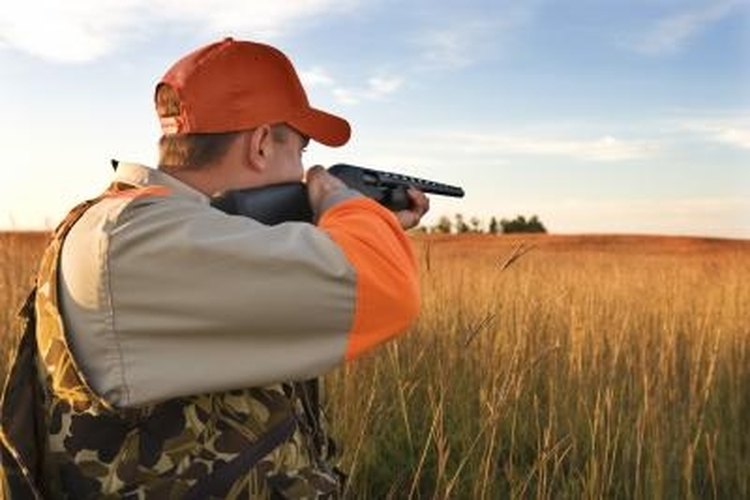 Jupiterimages/Comstock/Getty Images A properly choked shotgun will improve its performance.