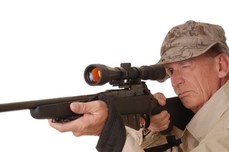 old soldier 1 image by Paul Moore from Fotolia.com Adjust a rifle scope by sighting-in to achieve the best accuracy.