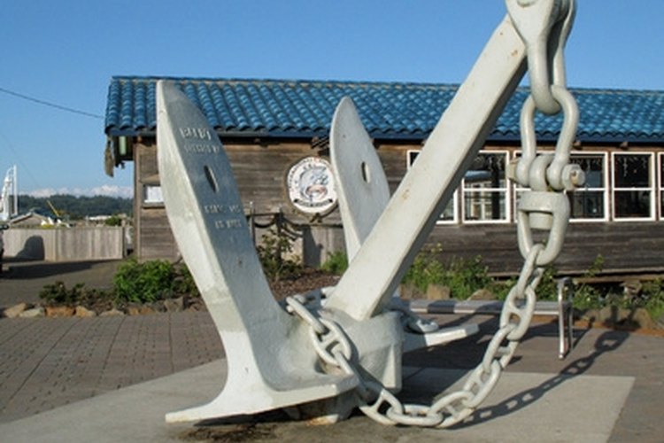 anchor image by pearlguy from Fotolia.com Anchoring a pontoon boat requires a good anchor and a bit of skill.