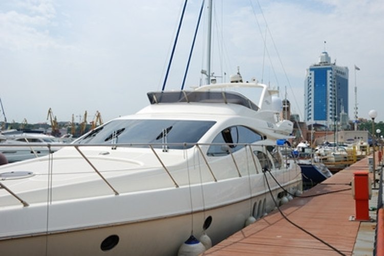 Cute sea motor boat image by Vasyl Dudenko from Fotolia.com A Sea Ray has screens over its windows and ports that can open.