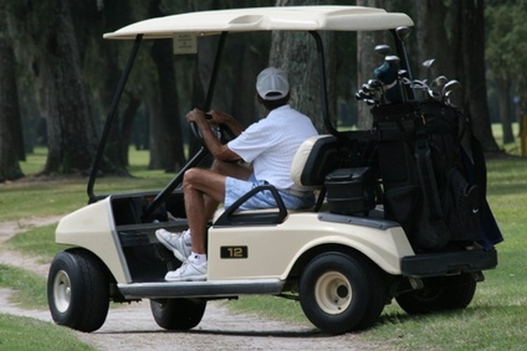 golf,golfers,cart,tee,sport,chiefland,florida image by Earl Robbins from Fotolia.com Golf cart in operation