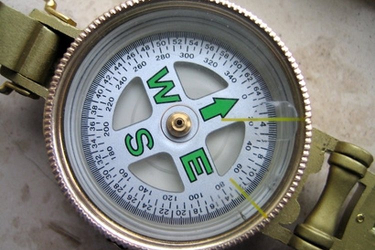 compass image by cico from Fotolia.com The lensatic compass is a useful aid in land navigation.
