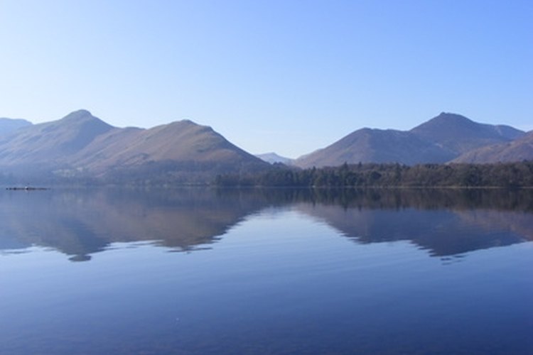 Derwent Lake, Keswick, Lake District National Park image by Kryzstofer from Fotolia.com Calculating the area of a lake by using geometry and graphing techniques.