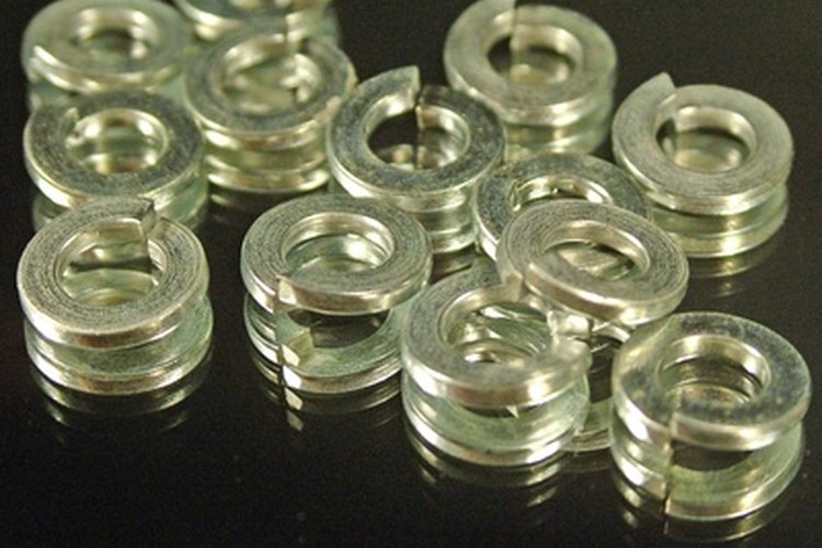 washers image by Greg Pickens from Fotolia.com Washers is a popular backyard game.