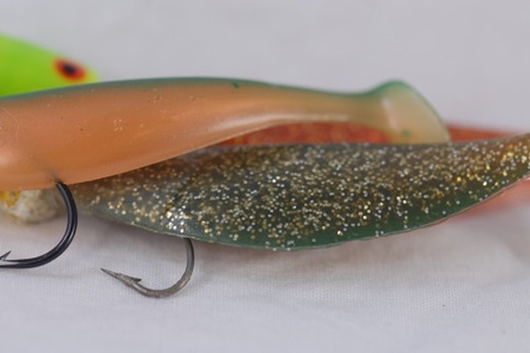 fishing lures image by jimcox40 from Fotolia.com Rubber or soft plastic lures are made of Plastisol.