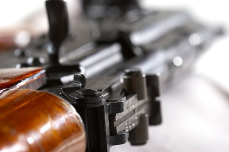 machine gun image by AGphotographer from Fotolia.com With a federal license, you can still own fully automatic weapons in the United States.