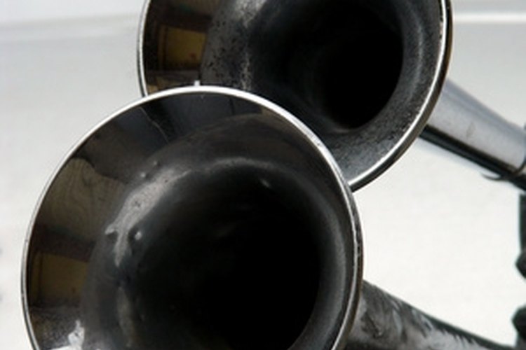 two horns image by John Sfondilias from Fotolia.com Fixing a boat horn doesn't require extensive electrical knowledge.