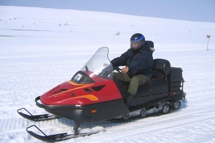 snowmobile riding image by Inger Anne Hulbækdal from Fotolia.com Loose tension causes thumping.