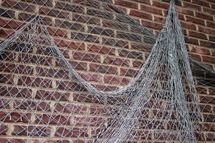 net image by cherie from Fotolia.com The techniques used to make fishing nets are also used for hammocks.