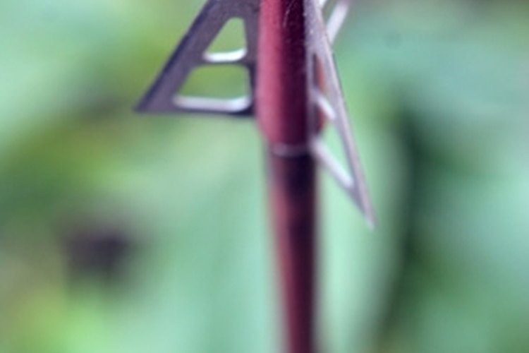 tip on an arrow image by Mat Hayward from Fotolia.com A properly cut arrow performs best.