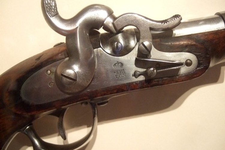 Pistole image by Volker Schwere from Fotolia.com Clean gunmetal with special gun oil.
