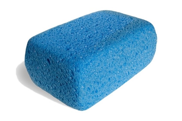 sponge for cleaning image by Serghei Velusceac from Fotolia.com Cleaning Airstream trailers brings out the shine of the metal.