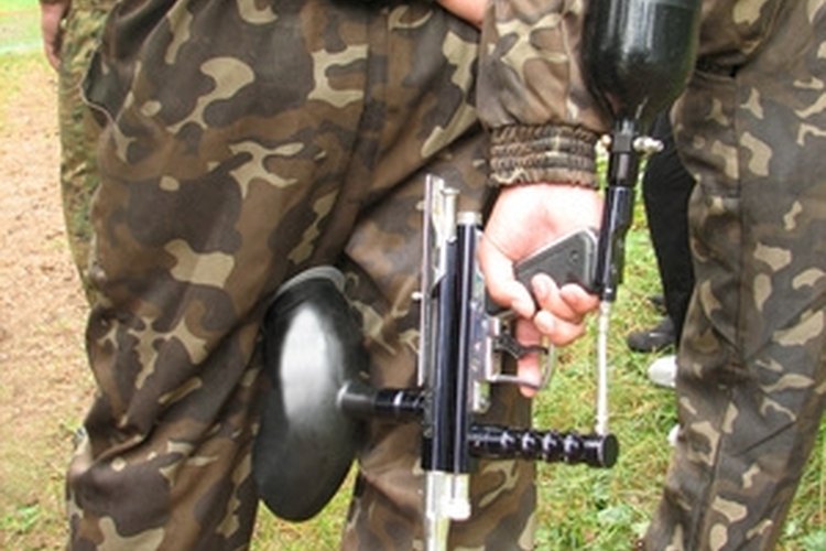 paintball weapon image by Alex from Fotolia.com Make a MOLLE vest to keep your gear secure out in the field.