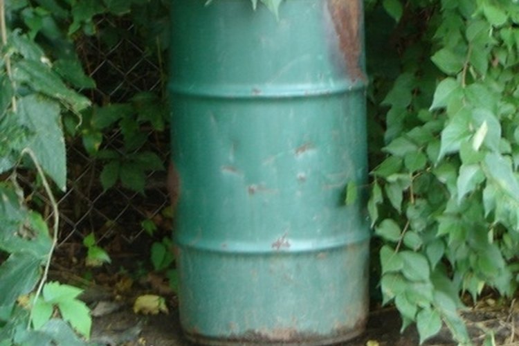 green barrel image by Tammy Mobley from Fotolia.com You can use 55-gallon barrels to make a pontoon boat